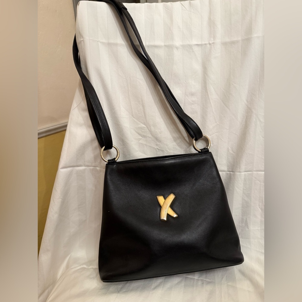 Paloma Picasso shoulder bag can be adjusted to be crossbody.